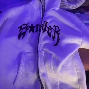 This is a pink and white hoodie, it’s in great condition